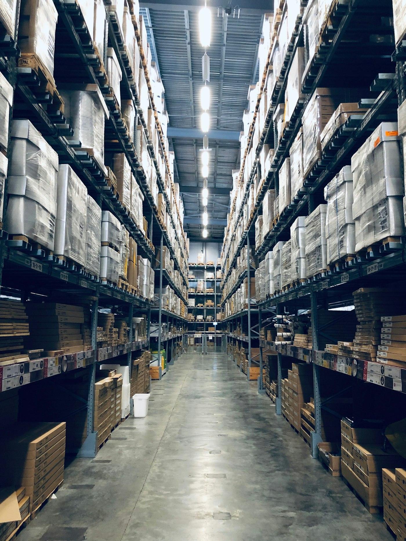 Tall racking aisle in a distribution warehouse